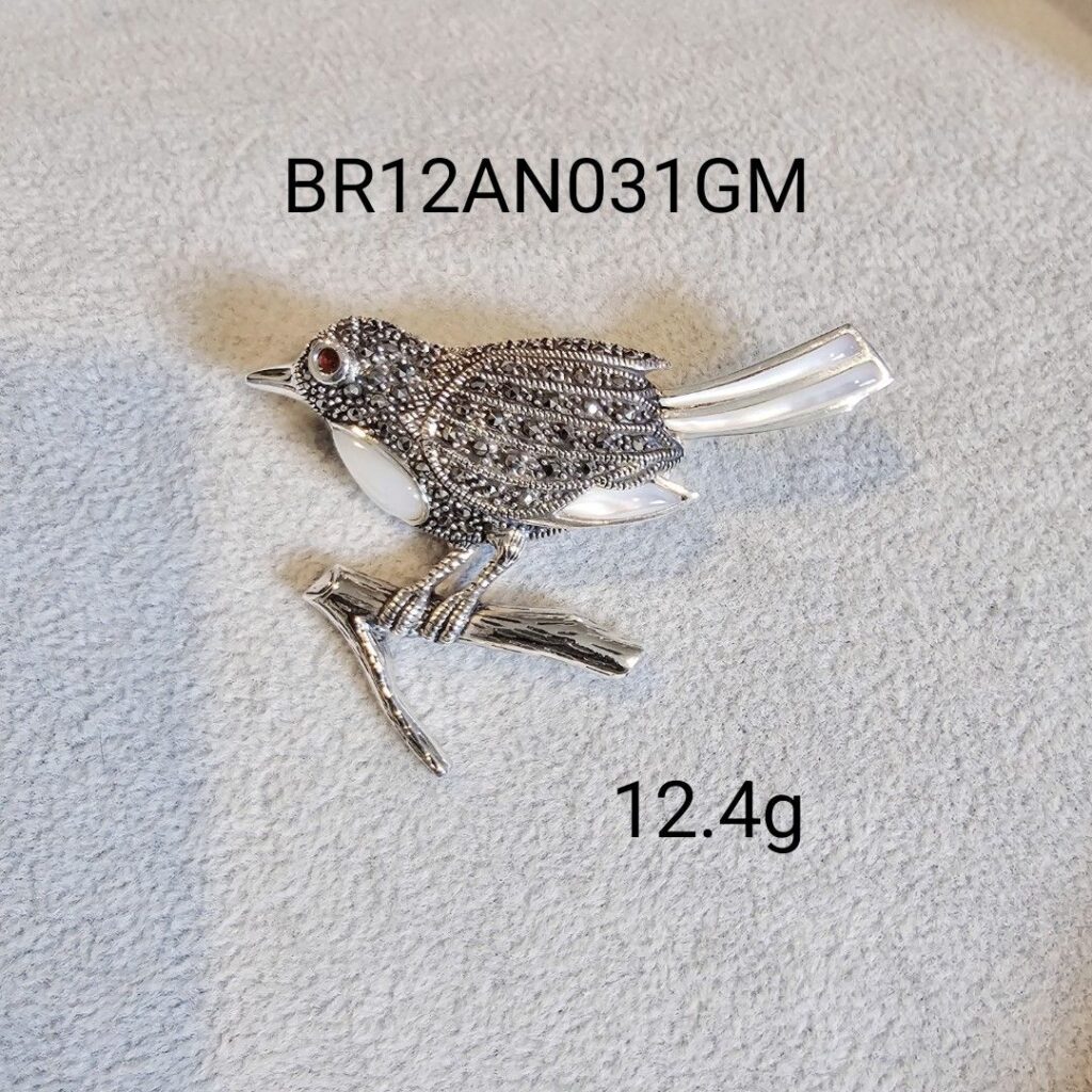 BR12AN031GM Lively Bird Marcasite Silver Brooch with Mother of Pearl and Garnet's eye